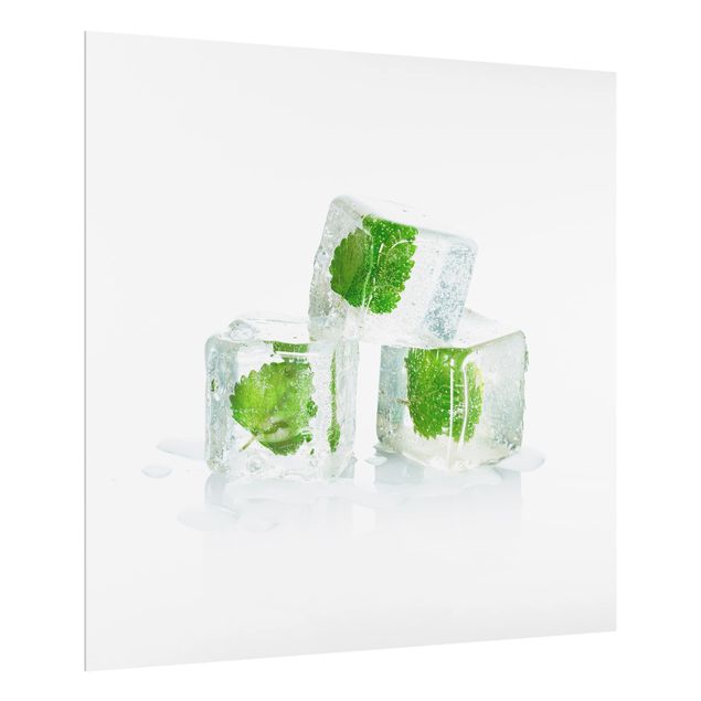 panel-antisalpicaduras-cocina Three Ice Cubes With Lemon Balm
