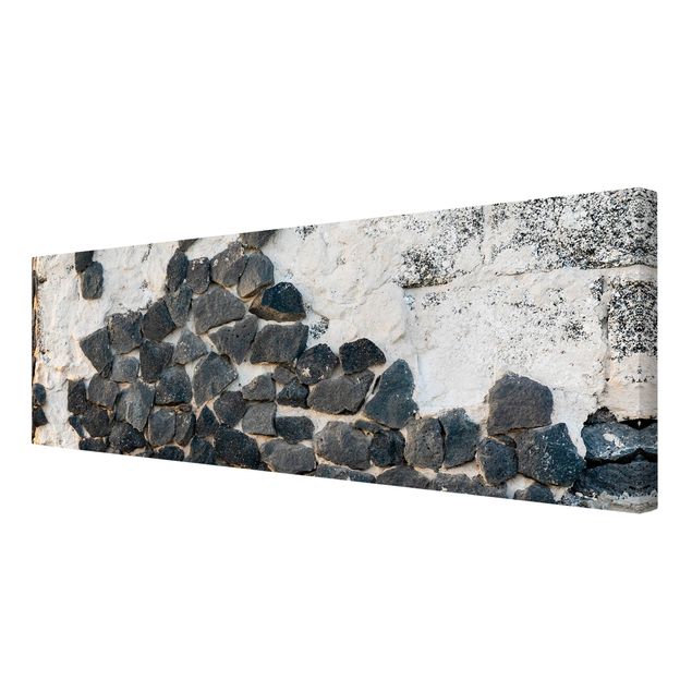 Cuadros grises Wall With Black Stones
