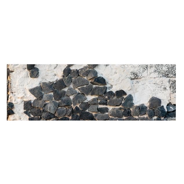 Cuadros modernos Wall With Black Stones
