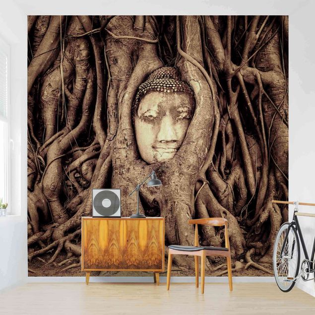 Papel pintado flores Buddha In Ayutthaya Lined From Tree Roots In Brown
