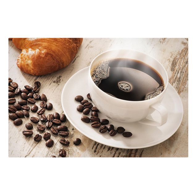 Cuadros decorativos Steaming coffee cup with coffee beans
