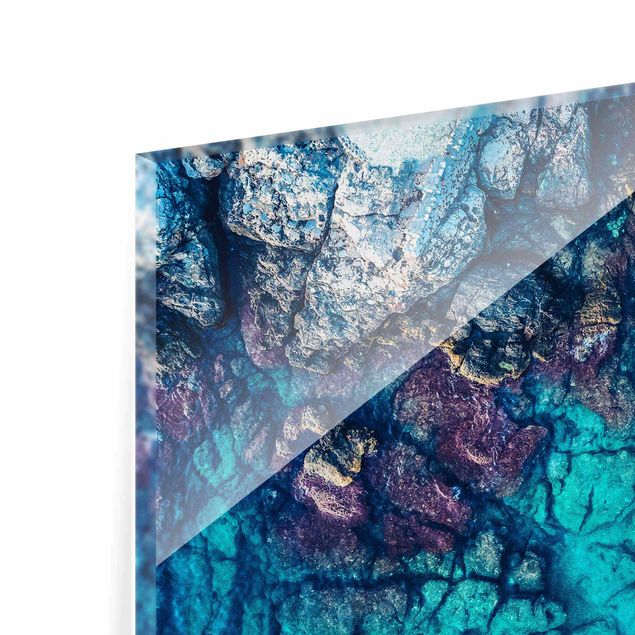 Cuadros de cristal paisajes Top View Colourful Rocky Coastline