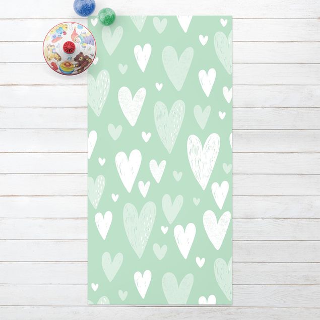 Alfombra exterior Small And Big Drawn White Hearts On Green