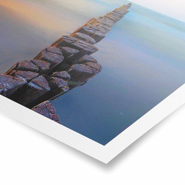 Póster paisajes para pared Groynes At Sunset At The Ocean