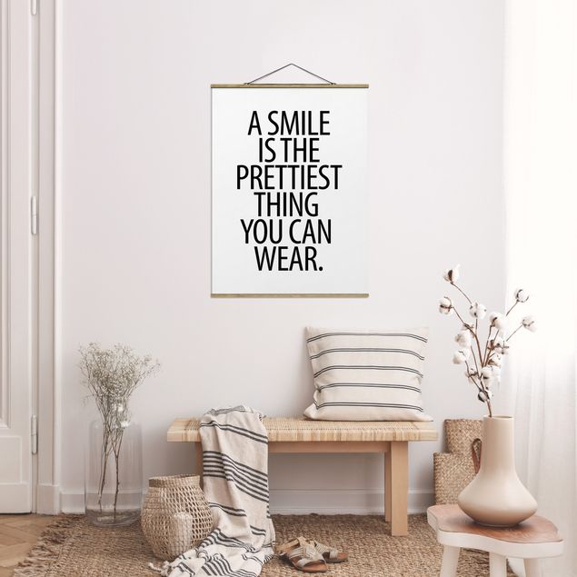 Cuadros frases A Smile Is The Prettiest Thing Sans Serif