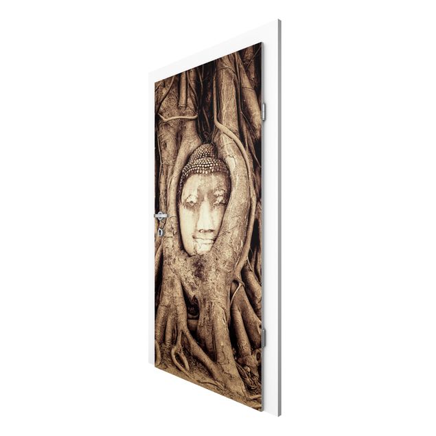 Papel pared flores Buddha In Ayutthaya Lined From Tree Roots In Brown