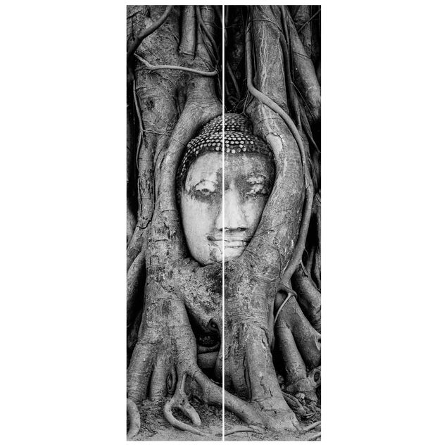 Papel pintado flores Buddha In Ayutthaya Lined From Tree Roots In Black And White