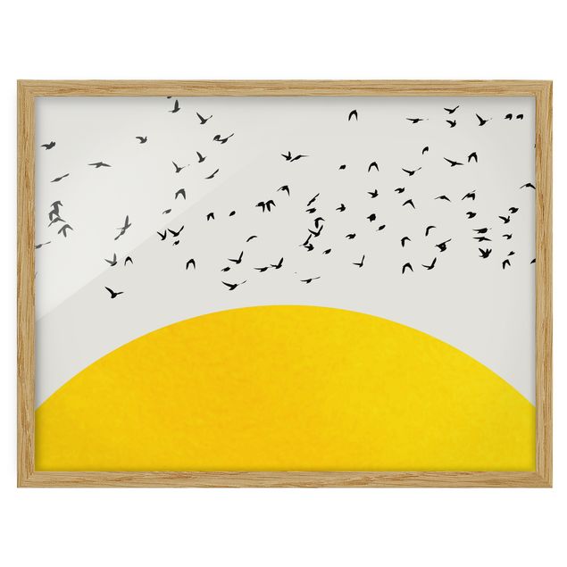 Pósters enmarcados de animales Flock Of Birds In Front Of Yellow Sun
